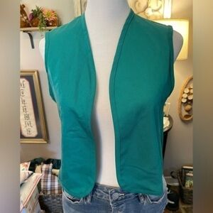 Girl Scouts vintage 1970s official uniform vest in teal.